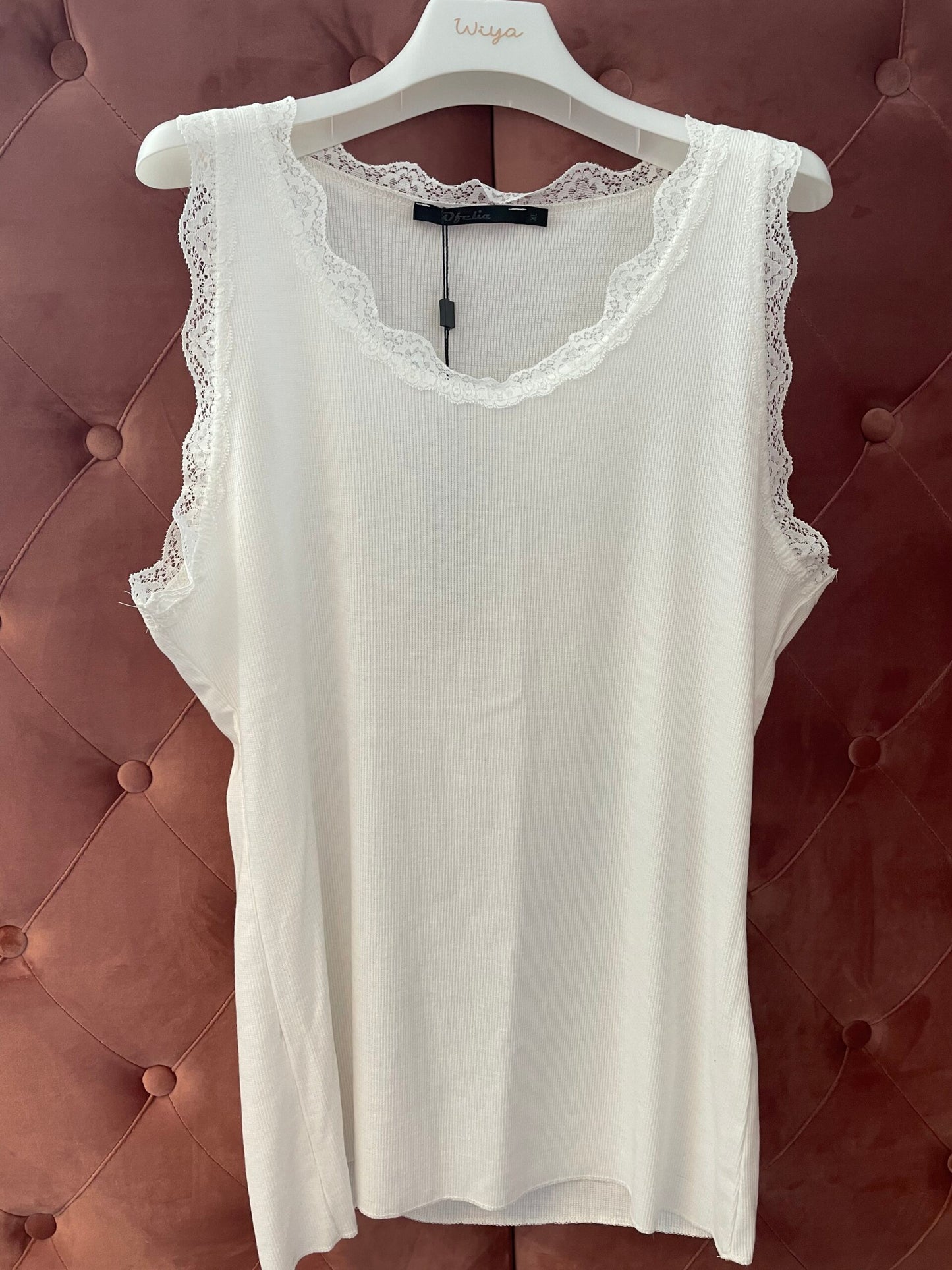 Of white blonde top/ LIVA K